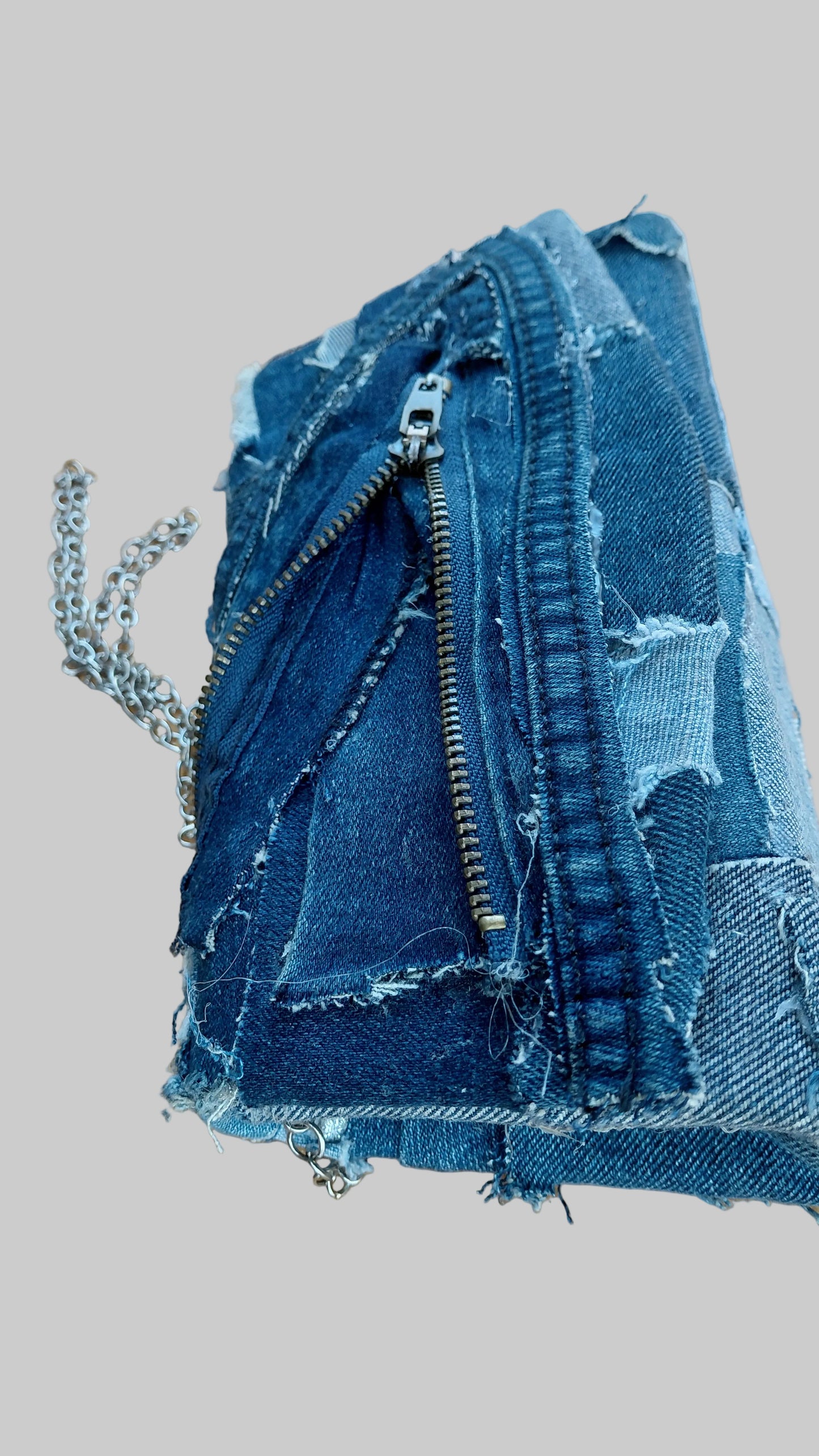 CLUTCH STYLE DENIM PURSE WITH SILVER CHAIN STRAP